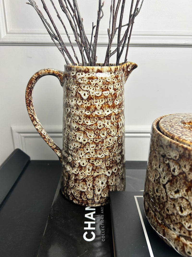 Mottled brown ceramic jug