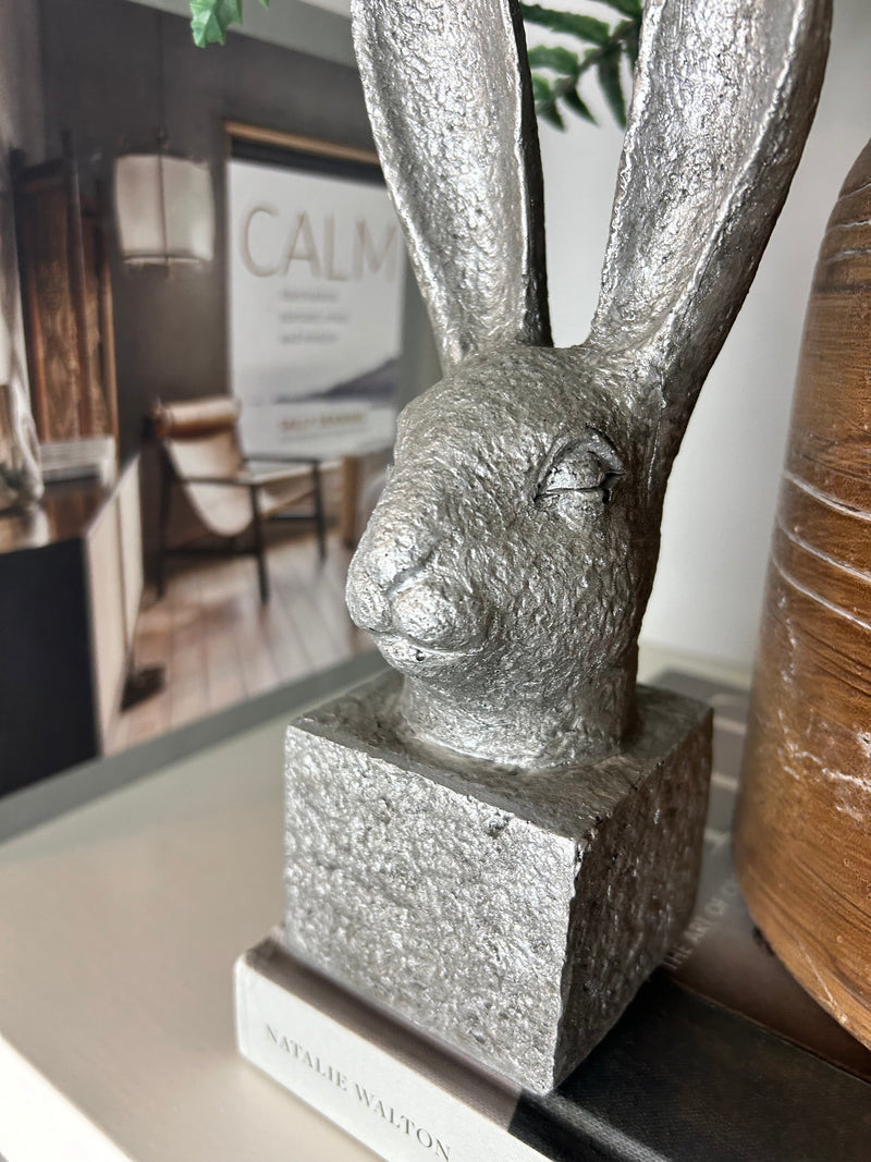 Stone hare rabbit head on stand