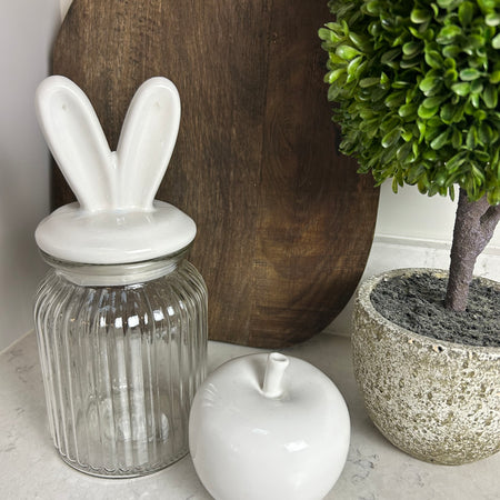 Glass storage jar with white bunny ears easter