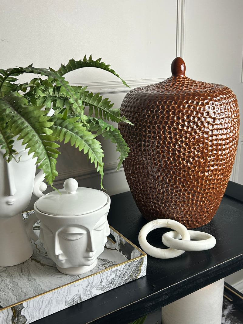 Burnt orange bobble pitted hammered ceramic lidded vase jar