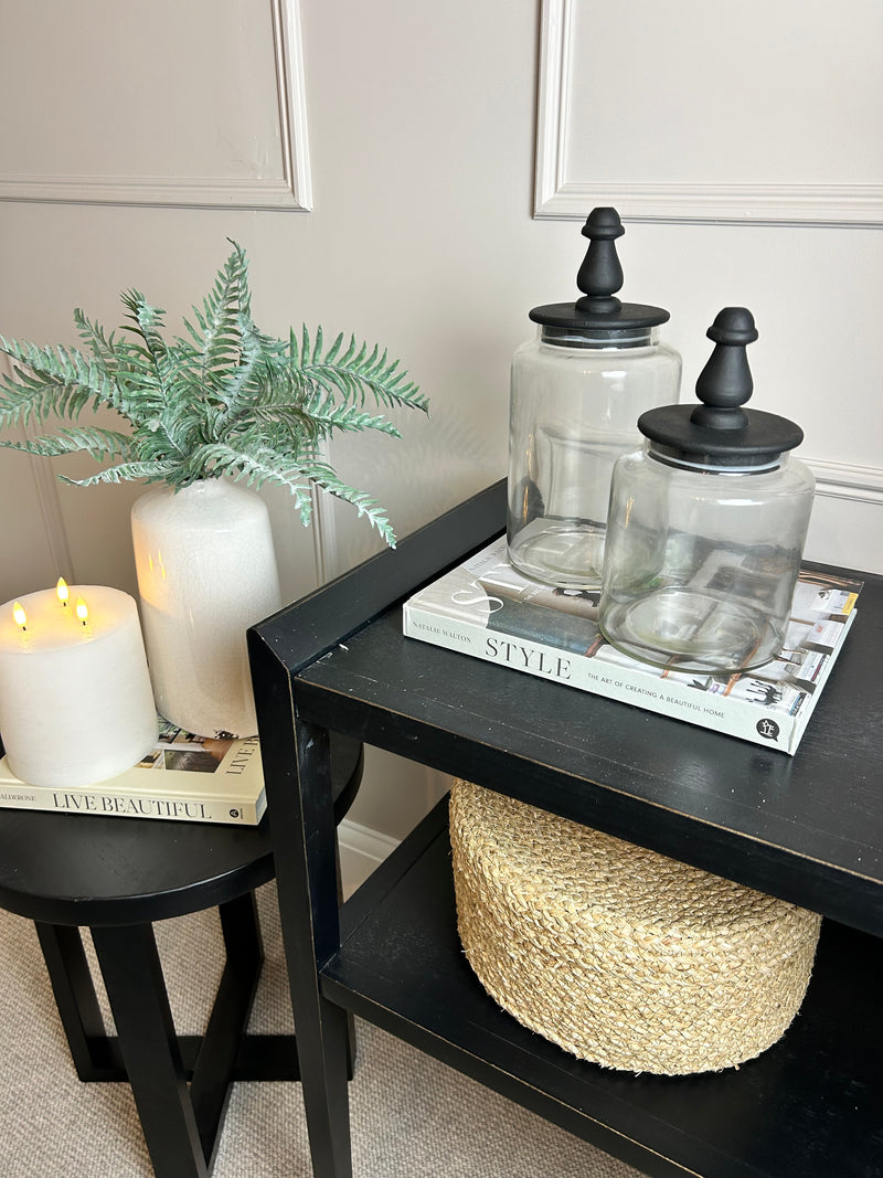 Glass jar with finial black lid