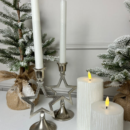 Pair of star silver candle sticks