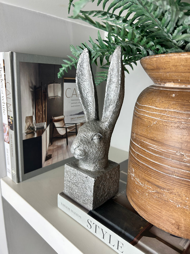 Stone hare rabbit head on stand