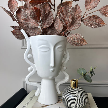 Ceramic white face urn vase