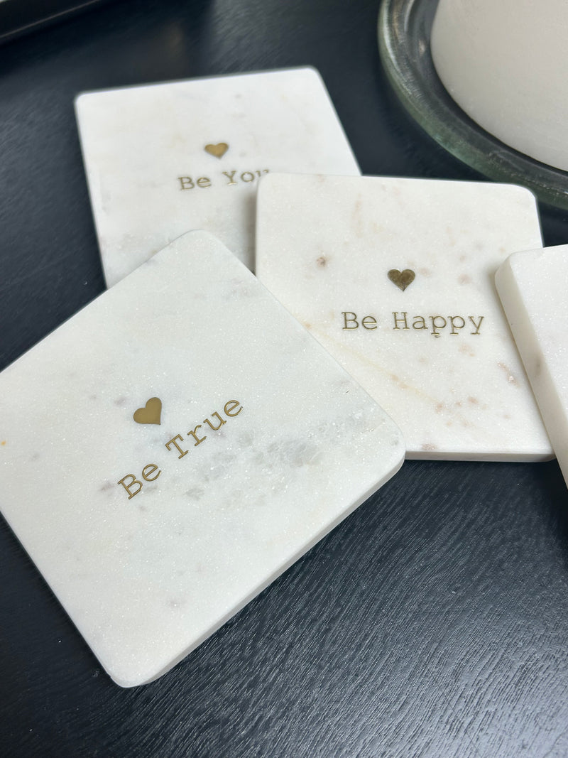 Set of 4 marble ‘be’ coasters