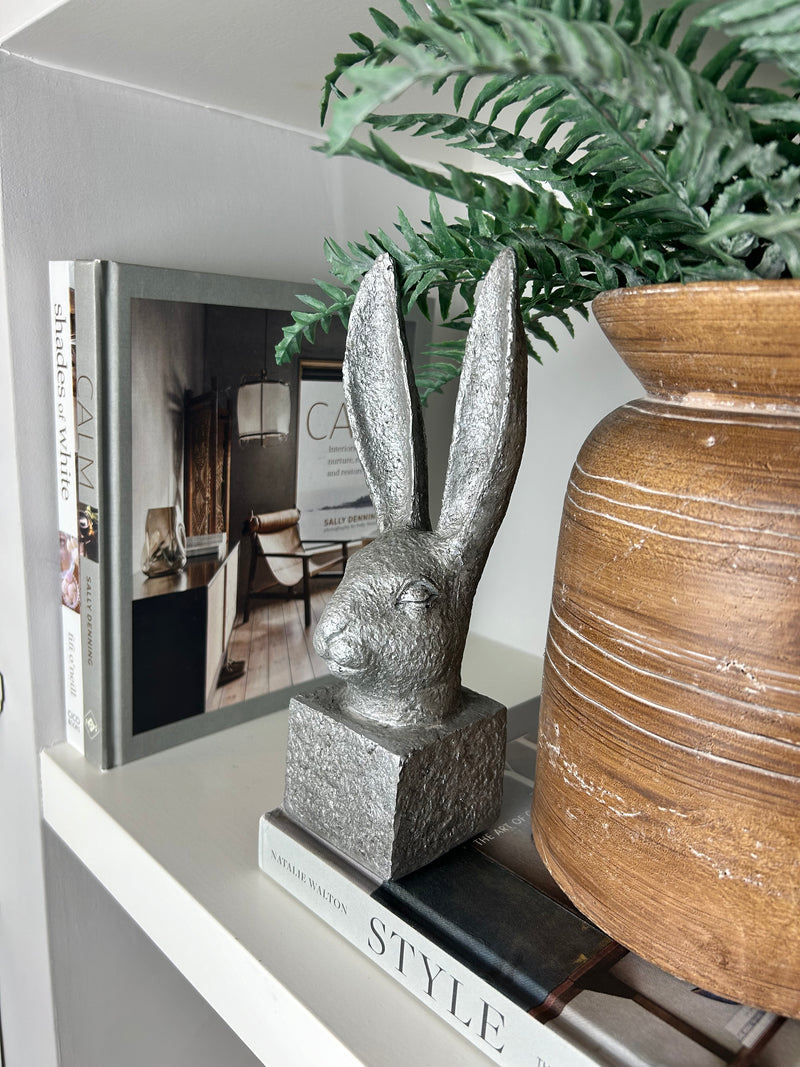 Stone hare rabbit head on stand