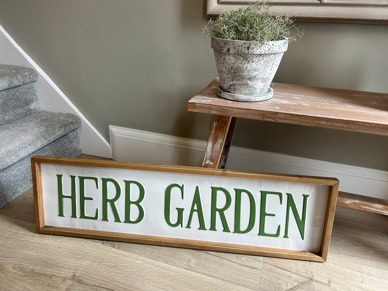 Large metal and wood garden sign