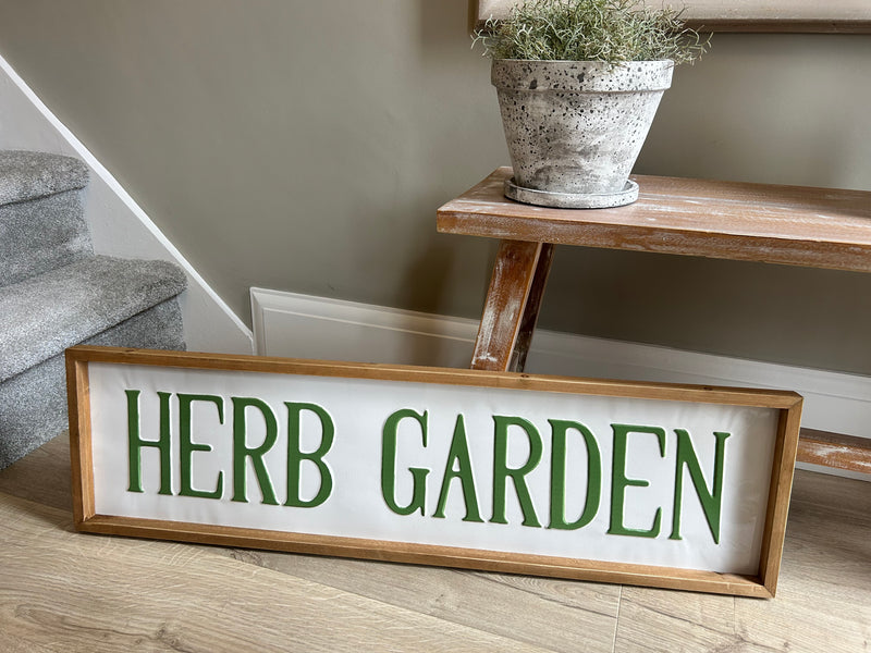 Large metal and wood garden sign