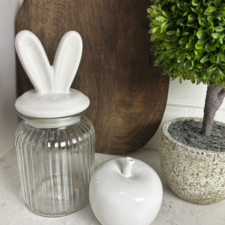 Glass storage jar with white bunny ears easter