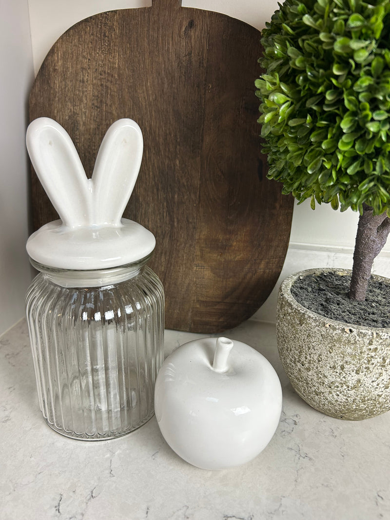 Glass storage jar with white bunny ears easter