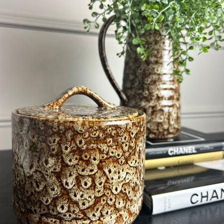 Chunky mottled brown ceramic lidded jar