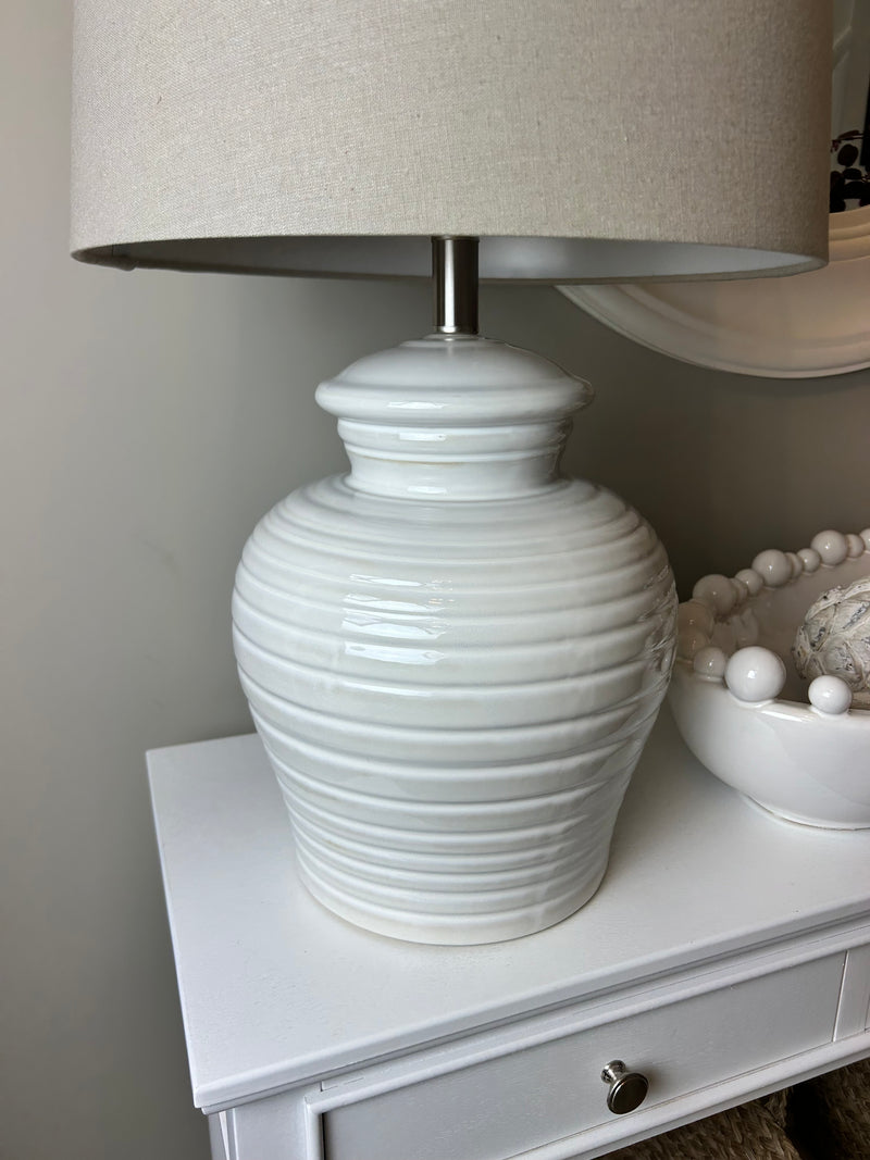 White ceramic ribbed lamp with shade