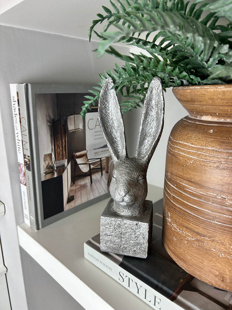 Stone hare rabbit head on stand