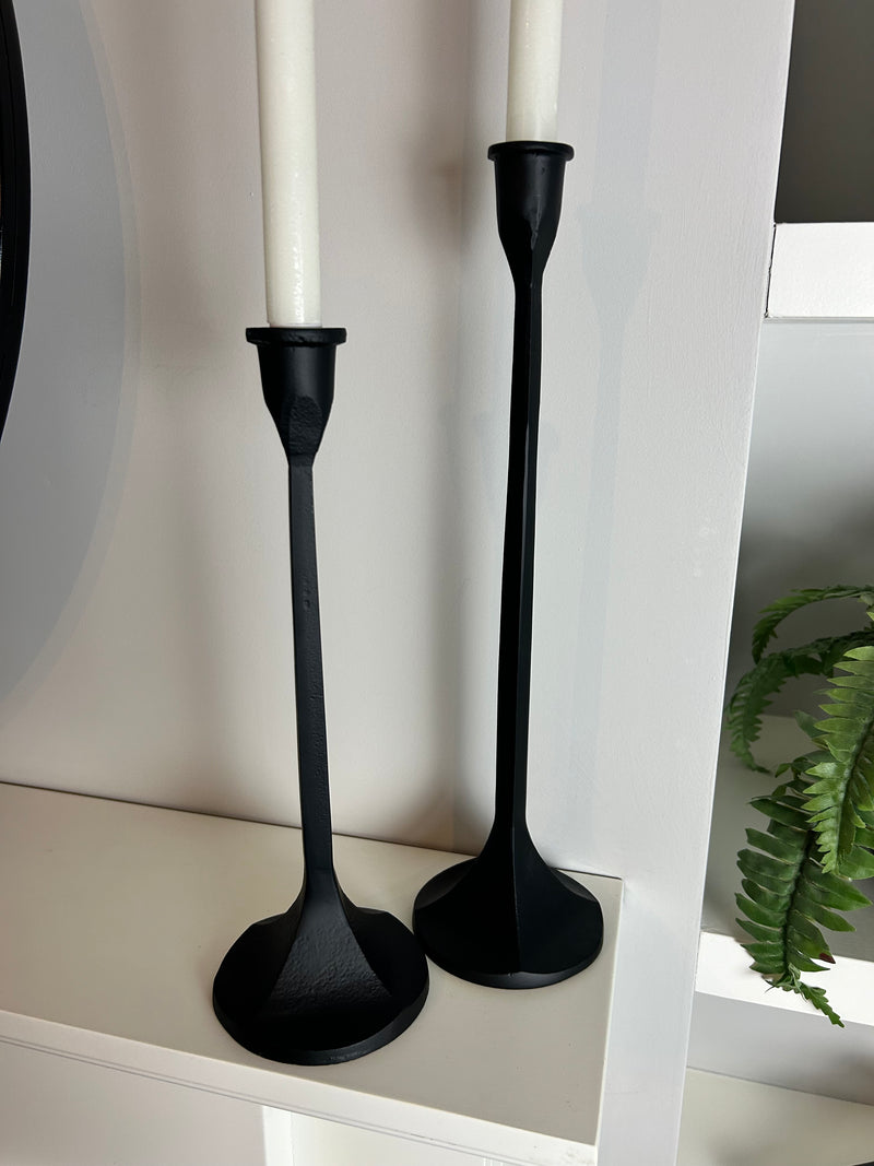 Pair of black metal candle sticks