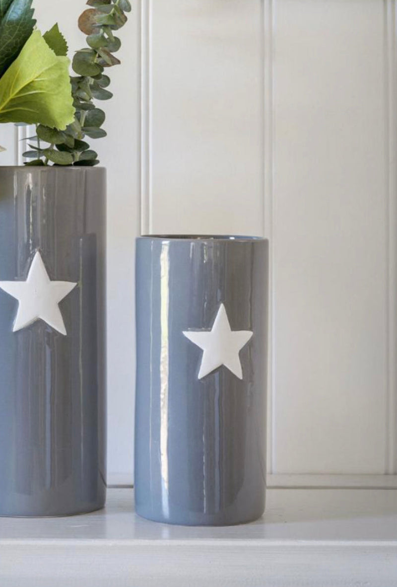 Grey ceramic vase with white star