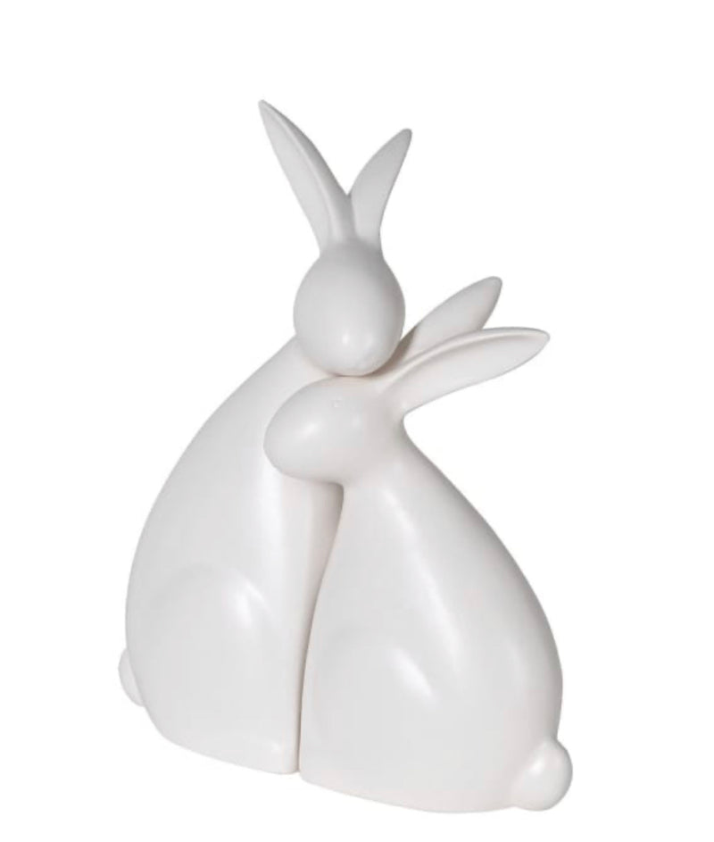 White ceramic hugging rabbits