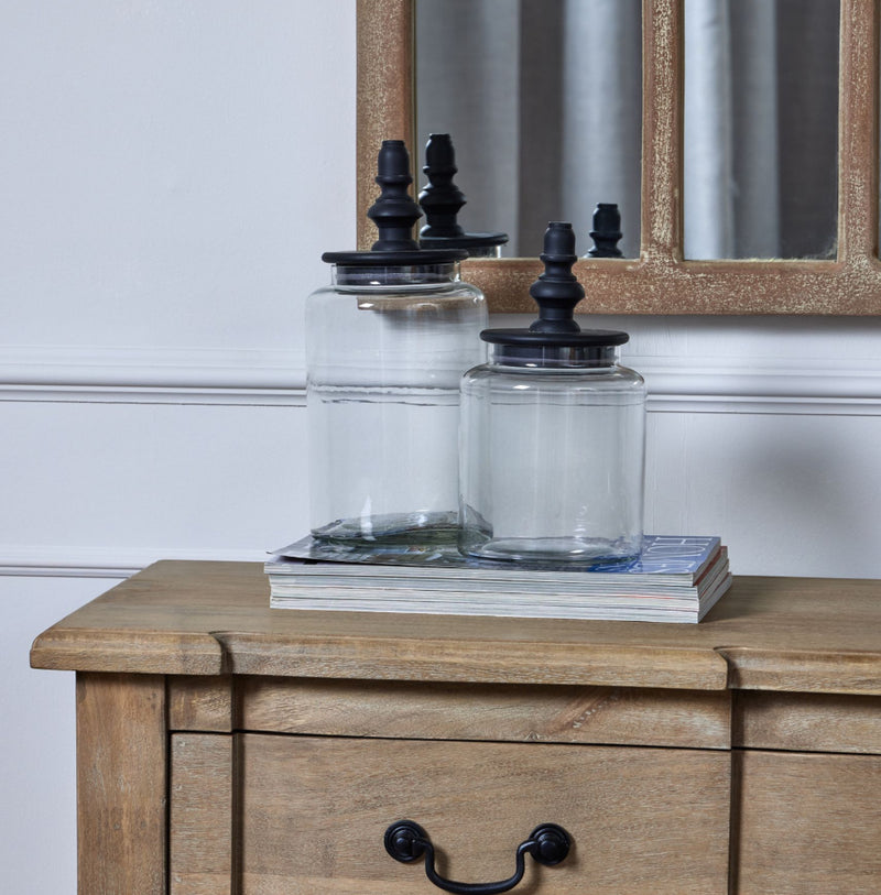 Glass jar with finial black lid