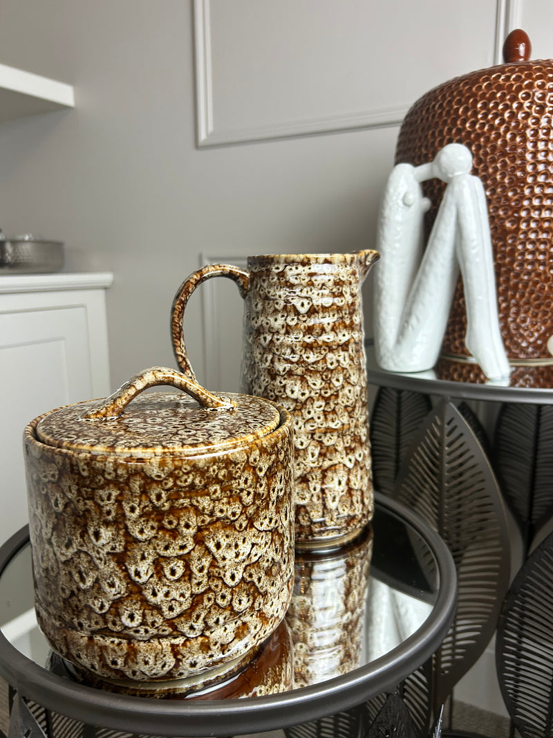 Mottled brown ceramic jug