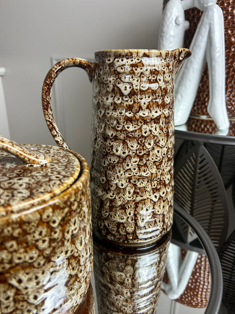 Mottled brown ceramic jug