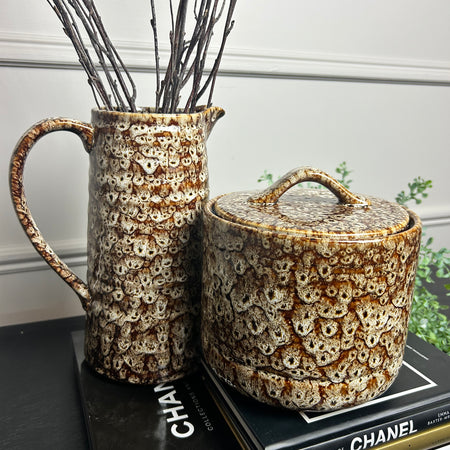 Mottled brown ceramic jug