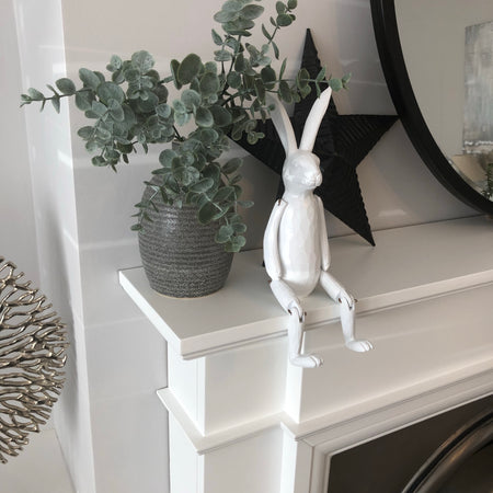 White jointed rabbit shelf sitter