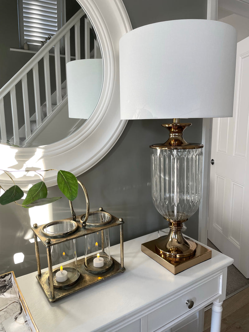 Gold urn lamp with white shade