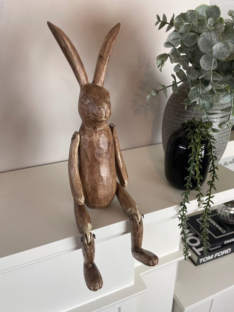 Brown jointed rabbit shelf sitter