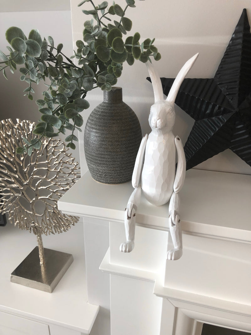 White jointed rabbit shelf sitter