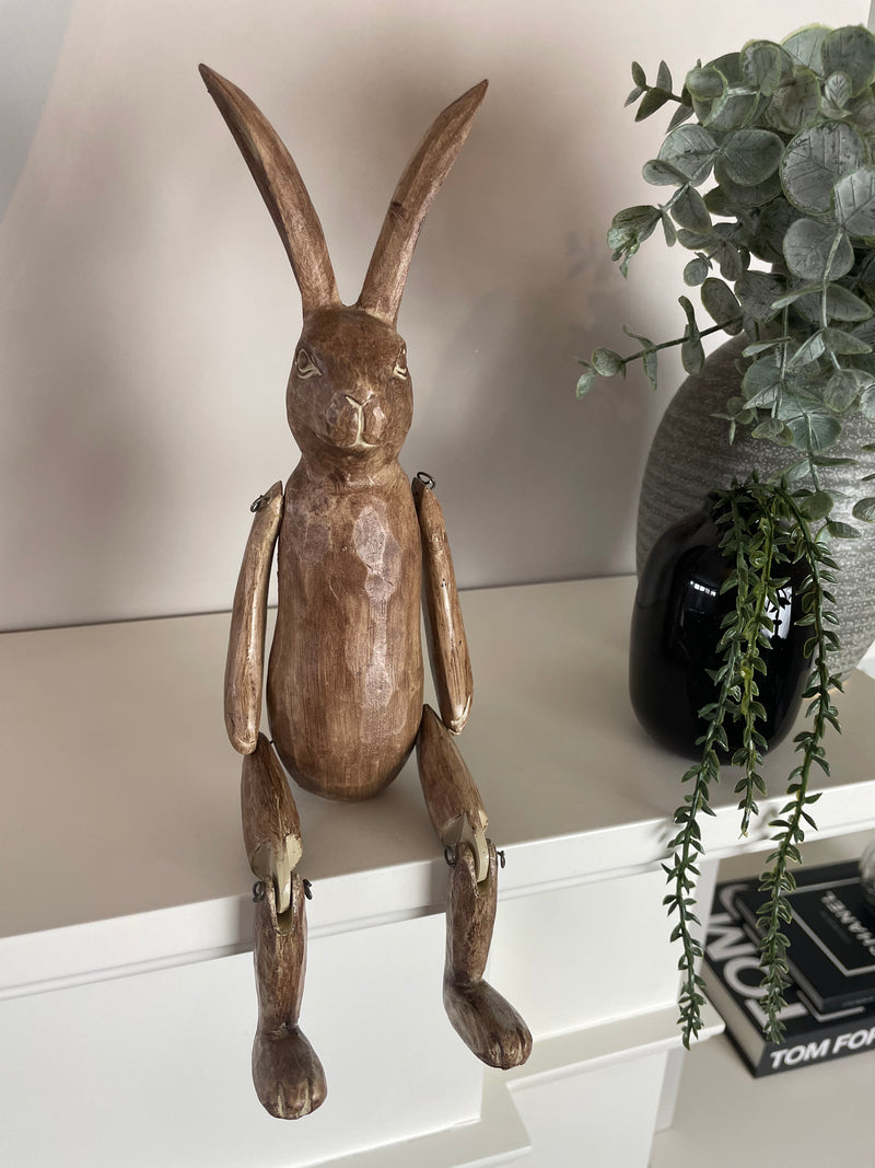 Brown jointed rabbit shelf sitter