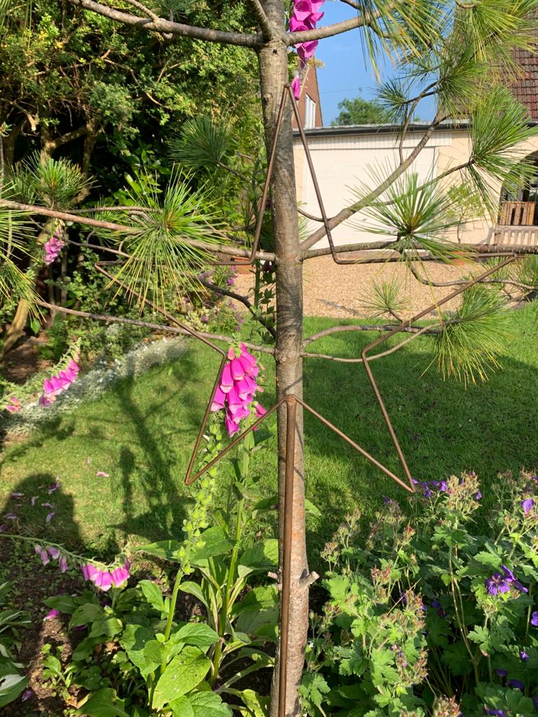 Small metal star garden stake