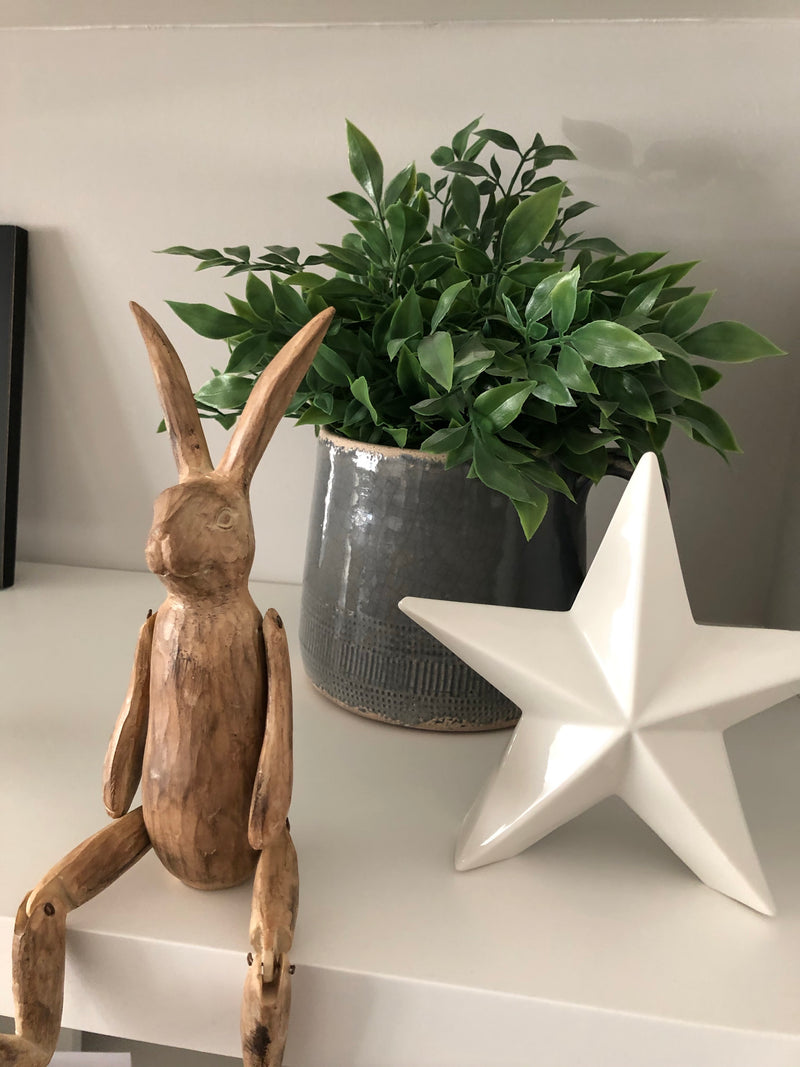 Brown jointed rabbit shelf sitter